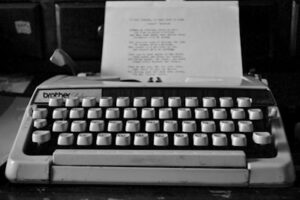 Typewriter and paper